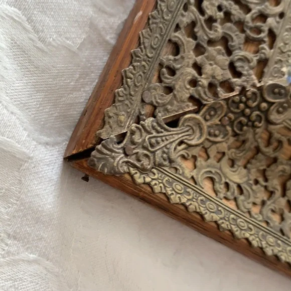 Hand painted on ivory? I am not an expert!! This is a very beautiful .